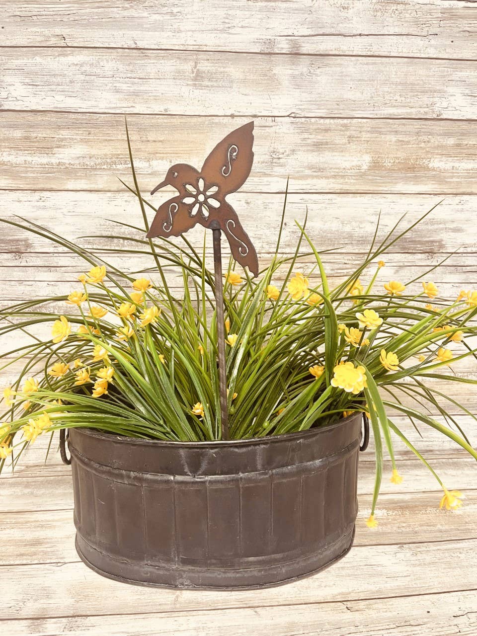 Hummingbird With Flower Stake