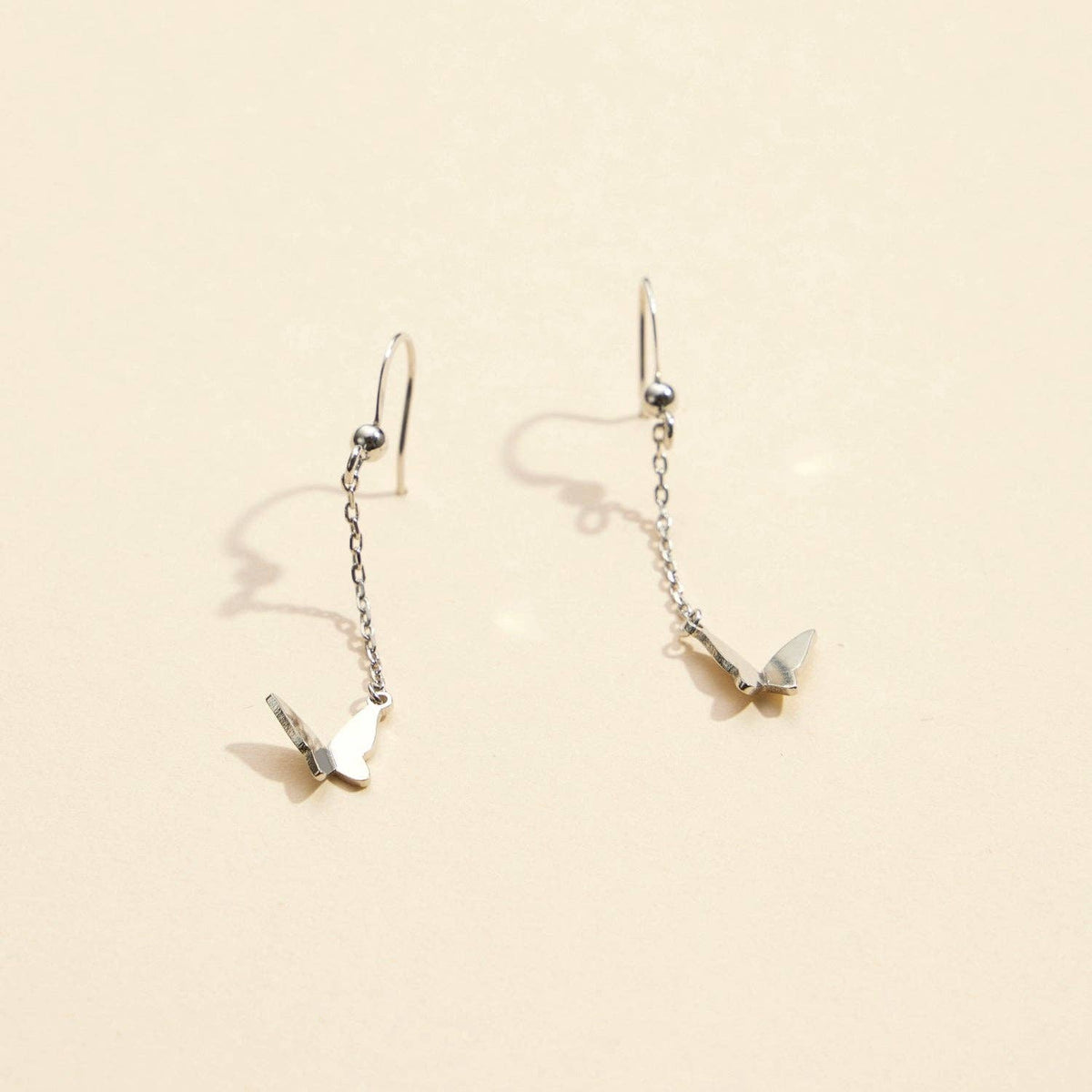 Butterfly Charm Gold Dip Dangling Earrings | Elegant Butterfly Charm Gold-Dipped Drop Earrings