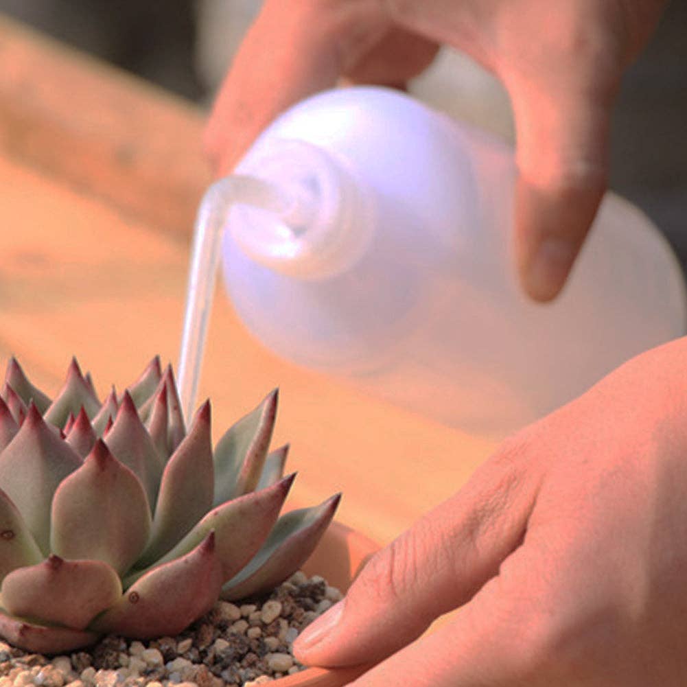 Squeezable Watering Bottle