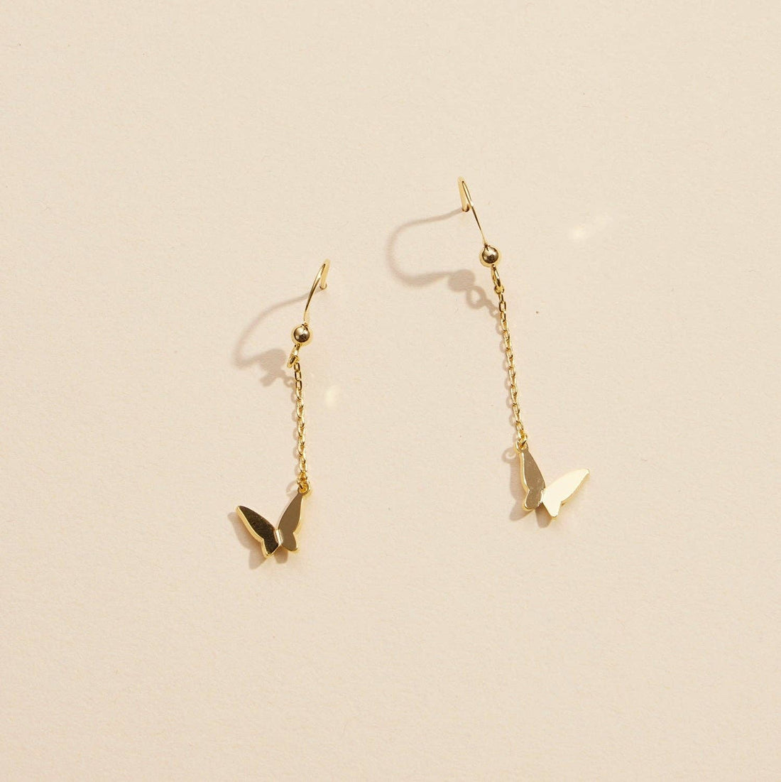Butterfly Charm Gold Dip Dangling Earrings | Elegant Butterfly Charm Gold-Dipped Drop Earrings