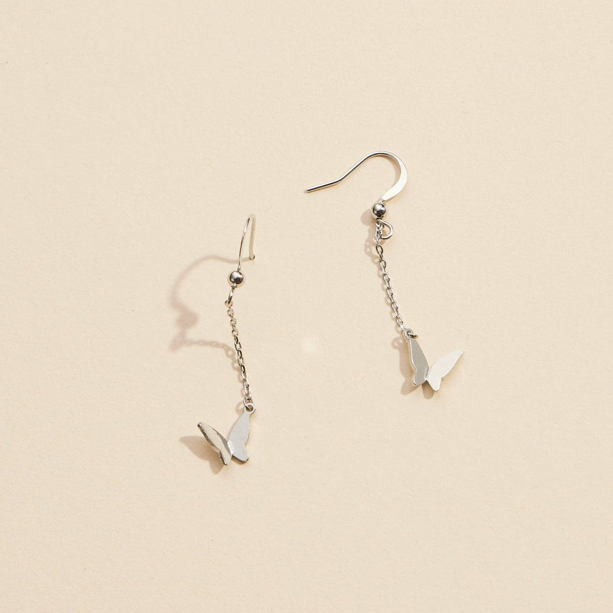 Butterfly Charm Gold Dip Dangling Earrings | Elegant Butterfly Charm Gold-Dipped Drop Earrings