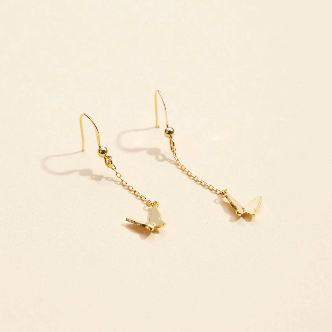 Butterfly Charm Gold Dip Dangling Earrings | Elegant Butterfly Charm Gold-Dipped Drop Earrings
